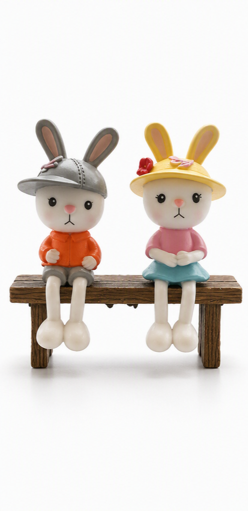 BUNNY COUPLE ON BENCH